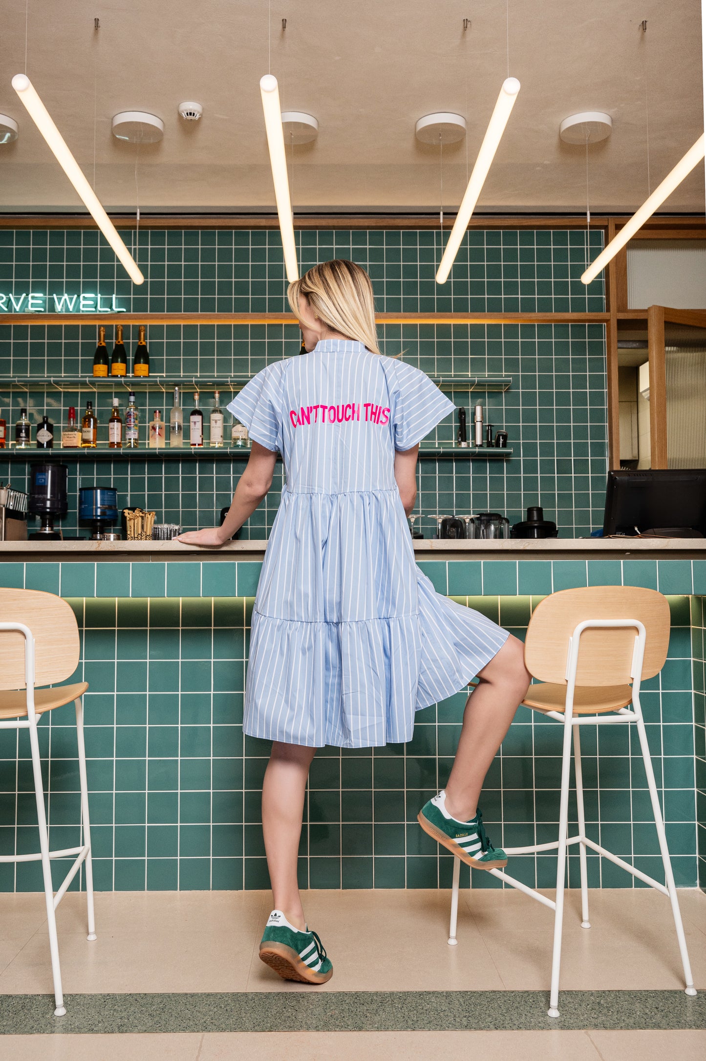 GUILTY - STRIPED MINI DRESS WITH PRINTED QUOTE IN THE BACK "CAN'T TOUCH THIS"