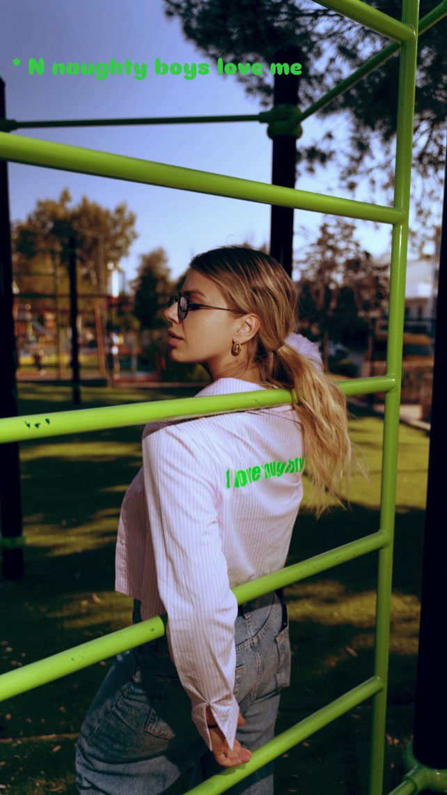 GUILTY - STRIPED TOP WITH PRINTED QUOTE IN THE BACK “I LOVE NAUGHTY”